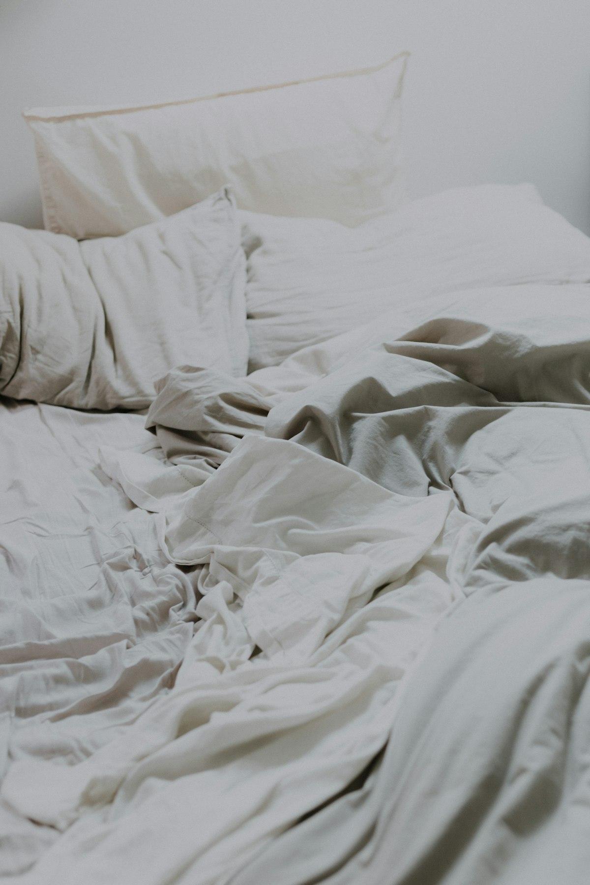 Soft white bedding and pillow, cloud-like and cozy